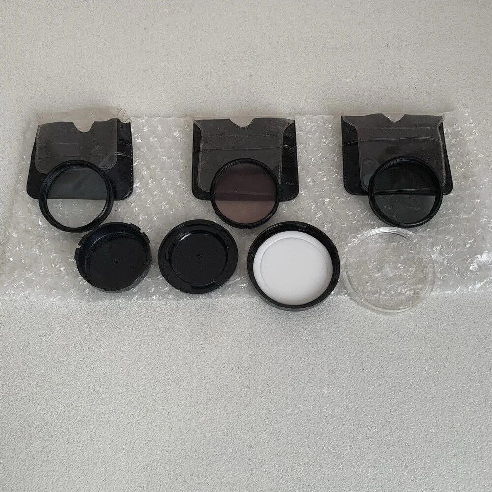 Lot Of 3 Rolev camera lens filters Star, Polorizer And FD Plastic Sleeve Cases